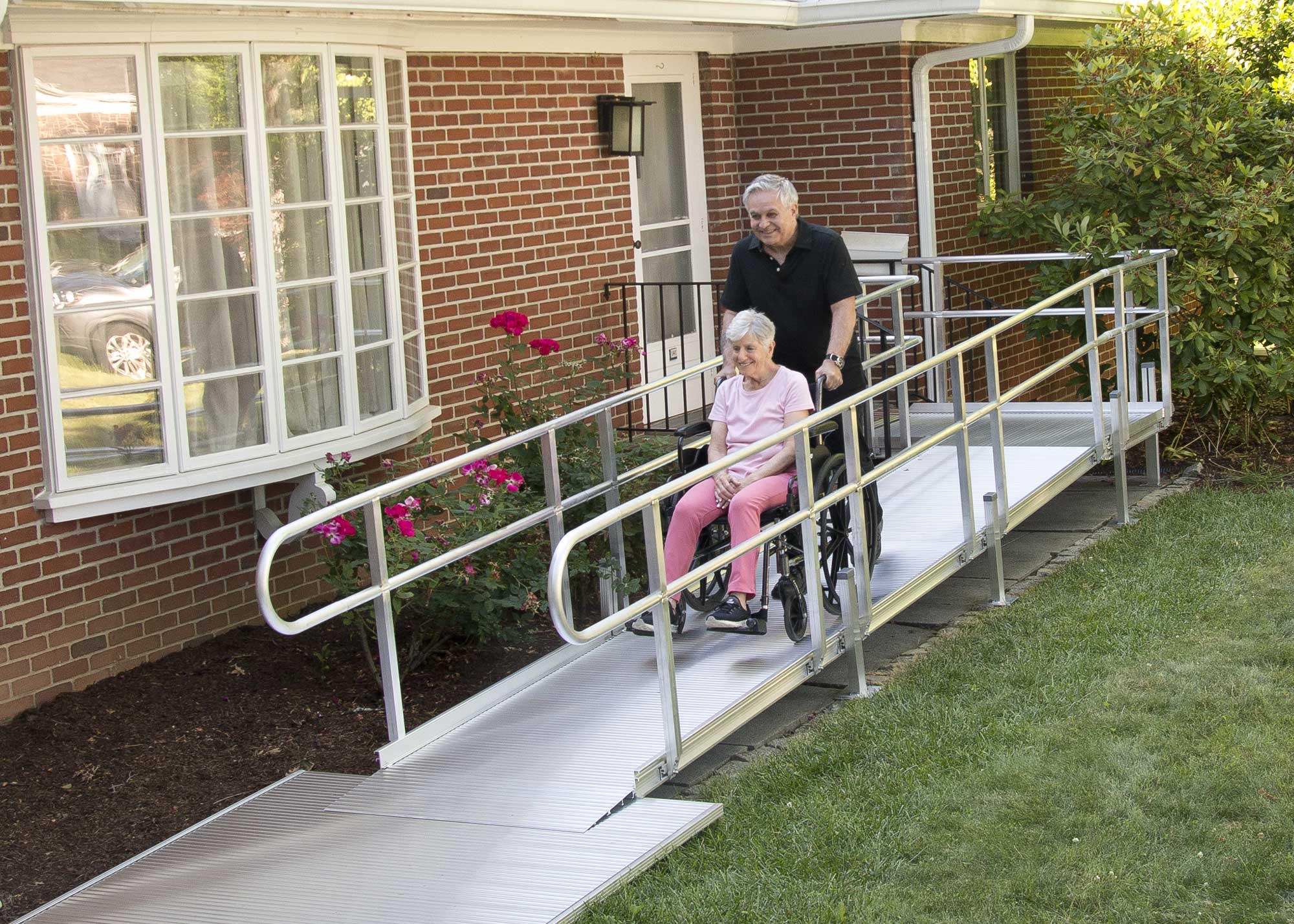Couple using the ramp with a wheelchair